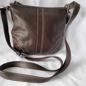 Coach (?) cross body purse with gold hardware.
